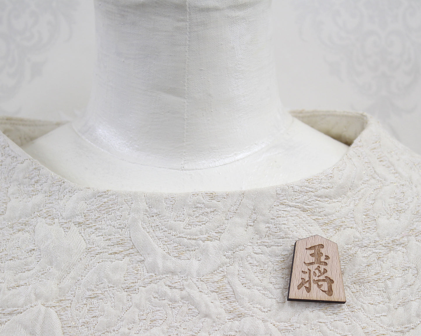Unique brooch in the shape of a Shogi piece