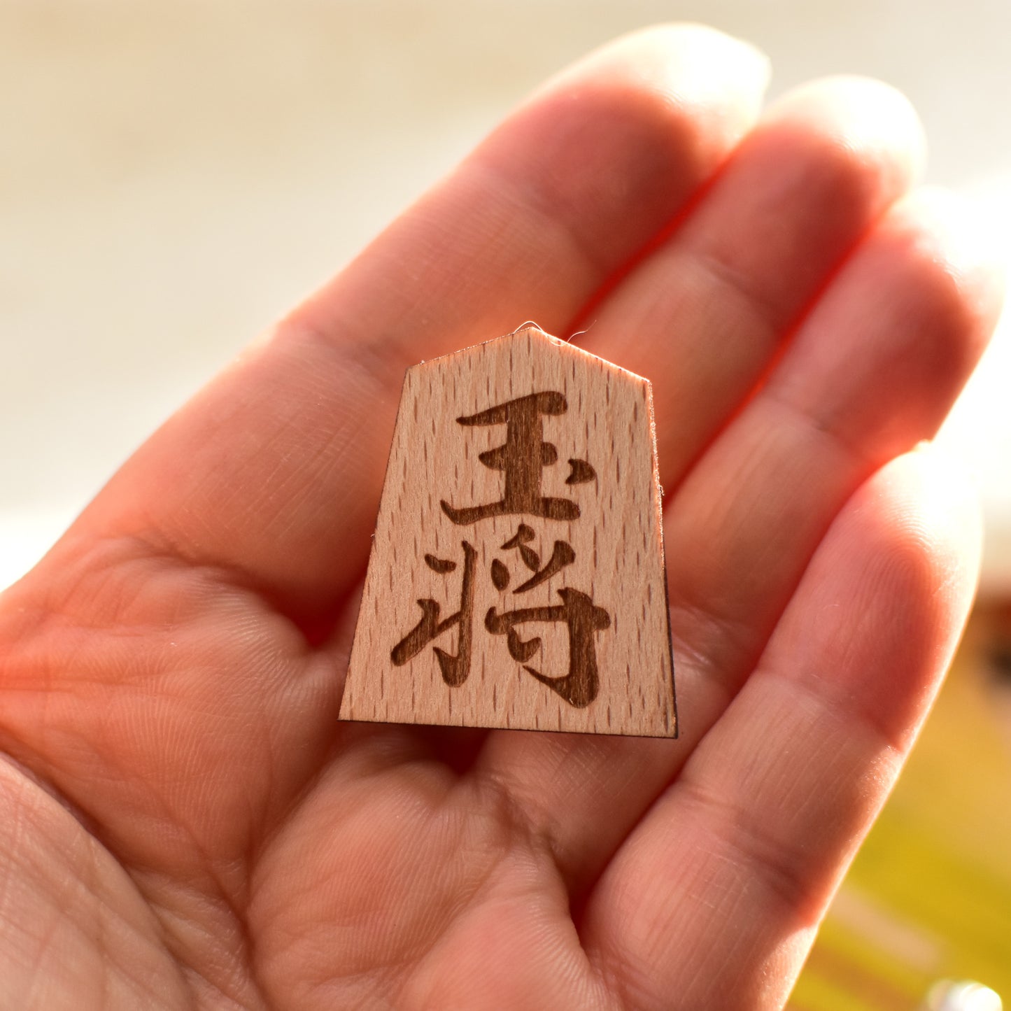 Unique brooch in the shape of a Shogi piece